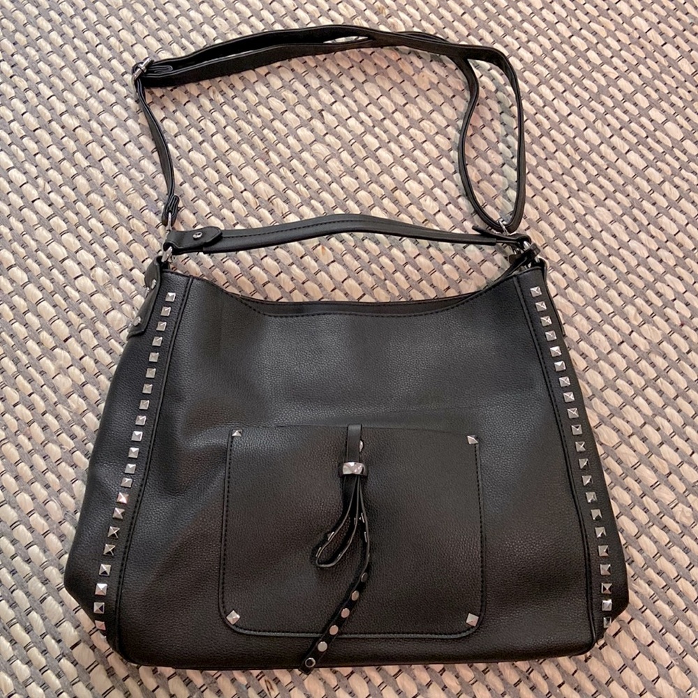 Basically brand new!! Medium/large size tote.